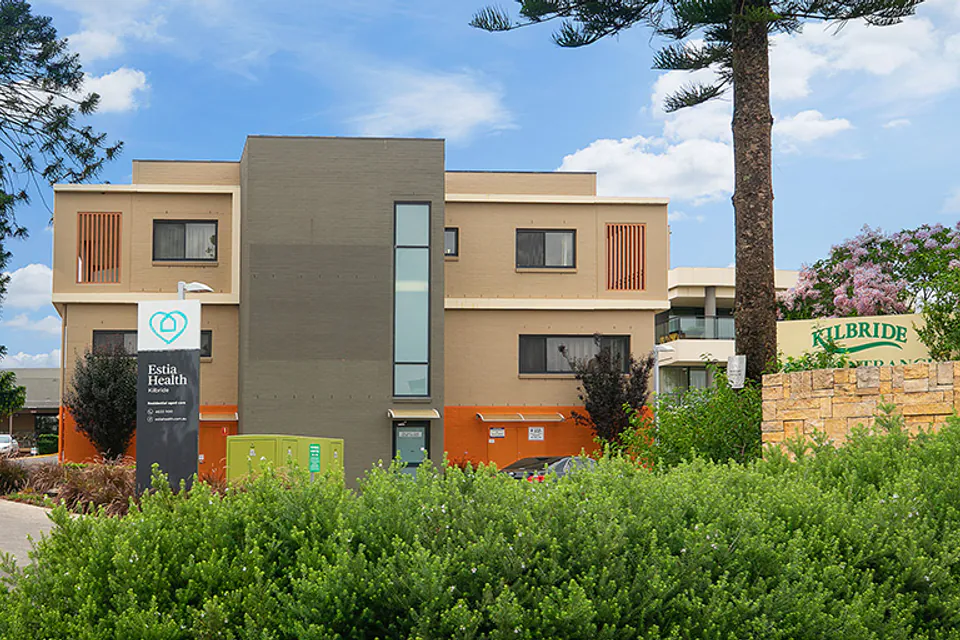 Multi-storey residence among trees
