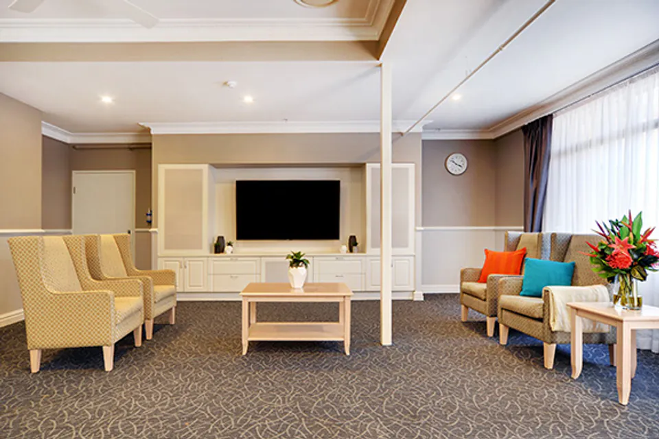 Armchairs and sofas in a communal lounge