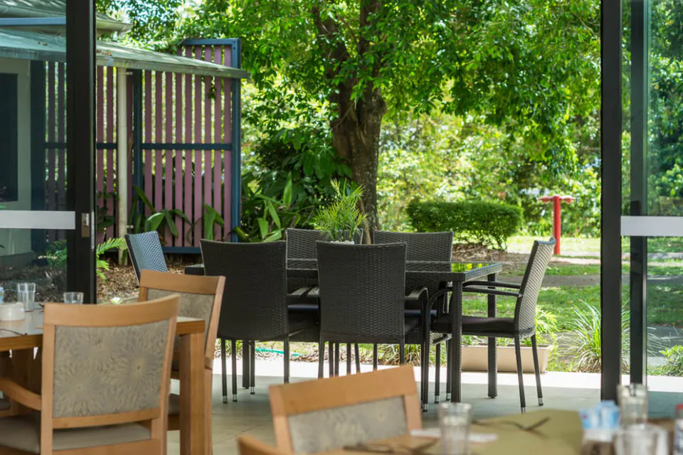 Covered entrance with outdoor seating