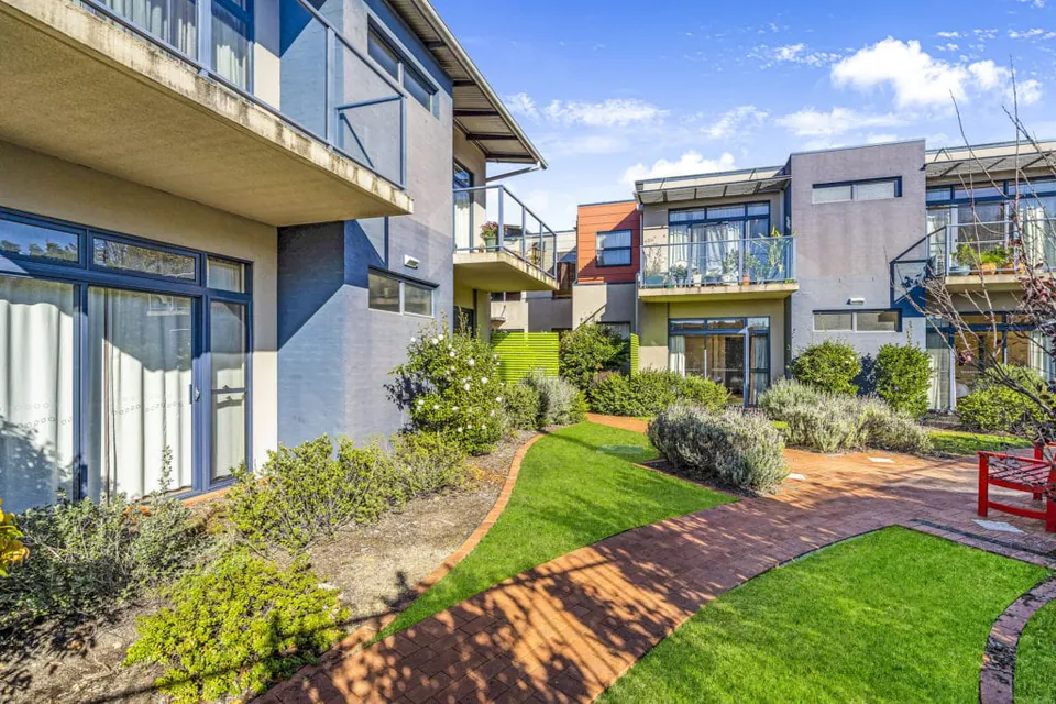 Landscaped path between residence wings