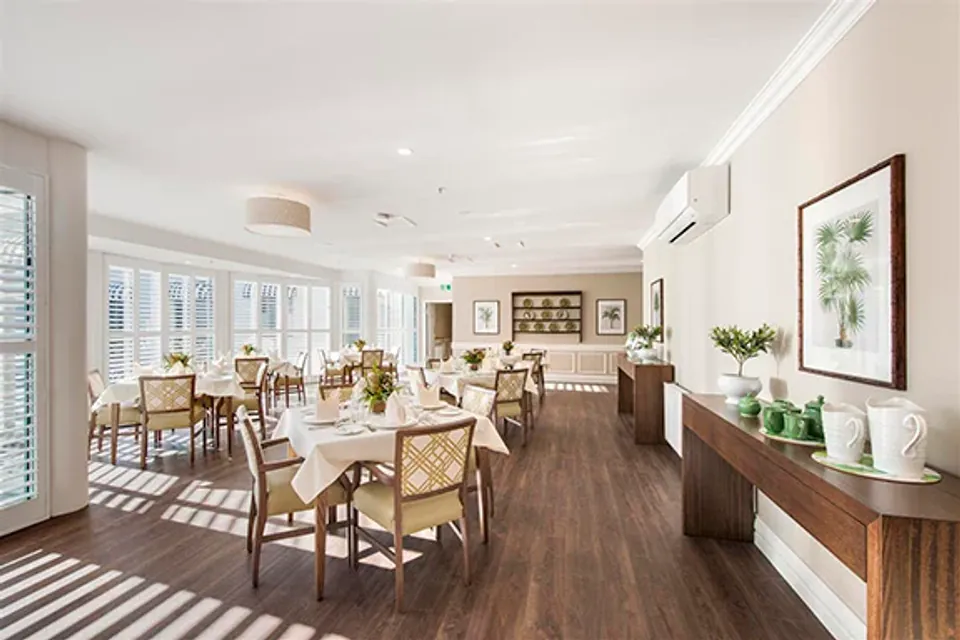 Dining room with tables set for meals