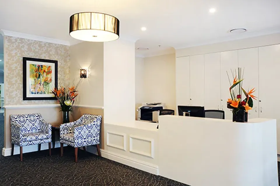 Reception desk and guest chairs
