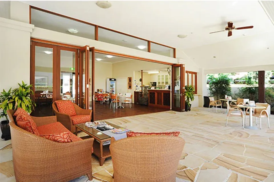Lounge opening to a dining room
