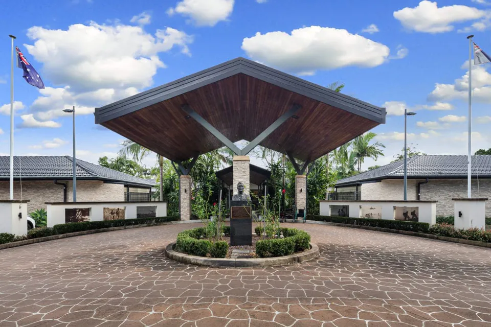 Covered entrance and circular garden bed