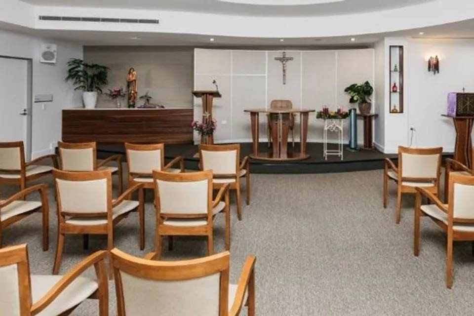Chapel with rows of chairs facing the altar