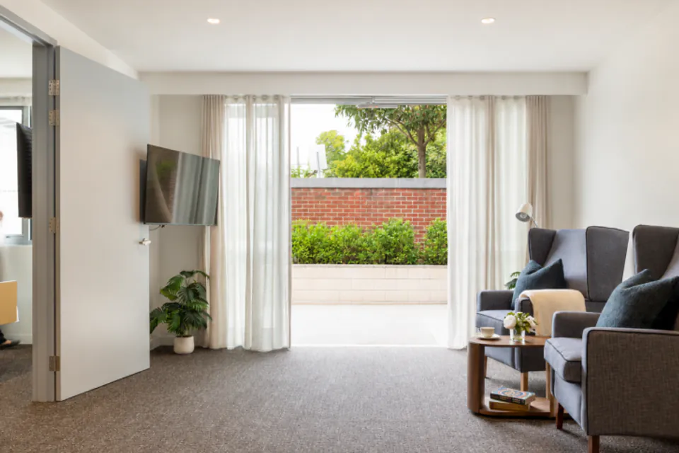 Sitting room opening to a garden courtyard.