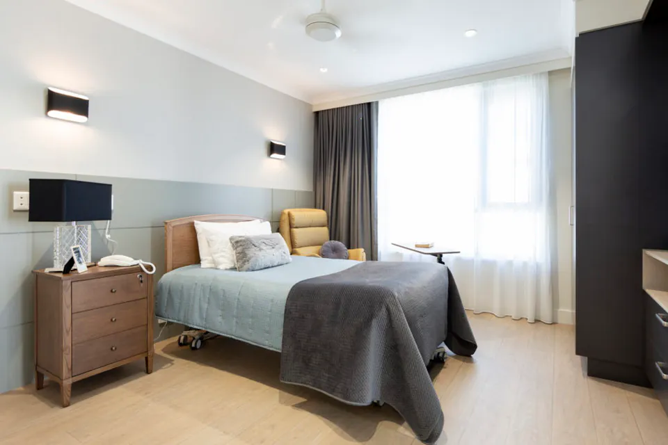 Bedroom with a single bed and bedside cabinet