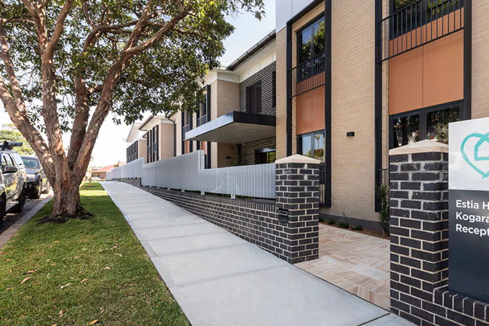 Brick and stone residence with entrance sign