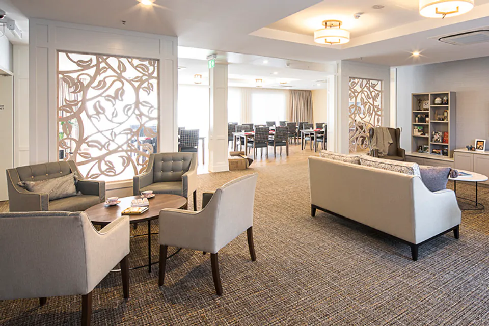 Lounge with sofas against a patterned wall