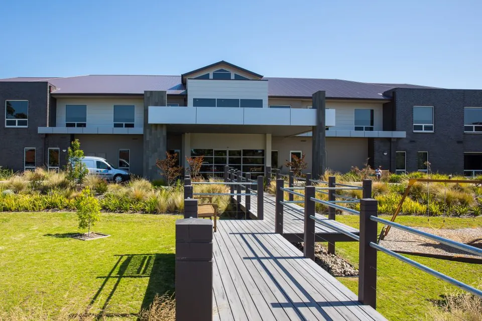 Two-storey residence and front lawn