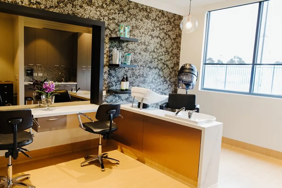 Hair salon with styling stations and mirrors