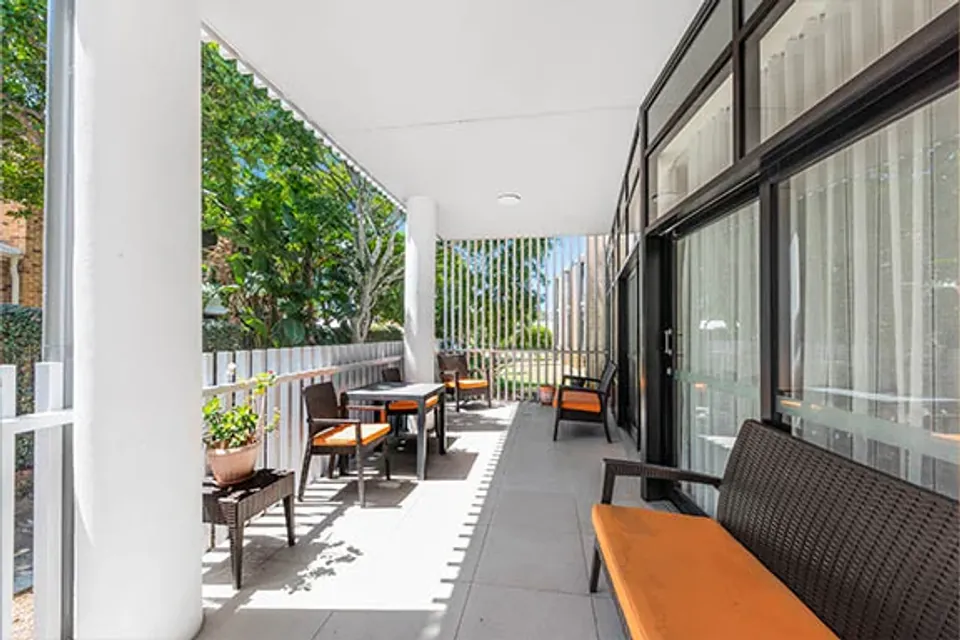 Veranda seating overlooking a garden