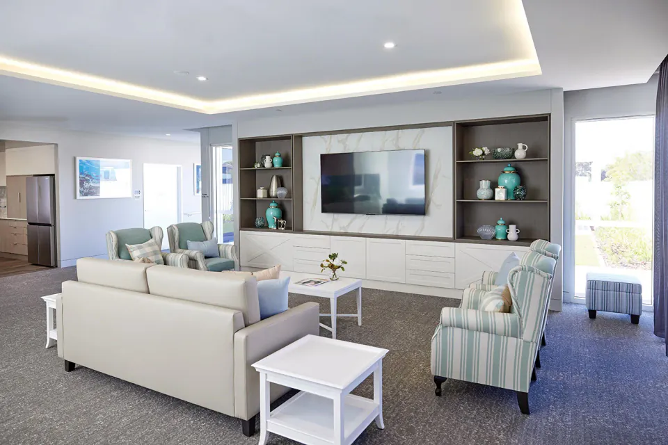 Lounge with sofas facing a television
