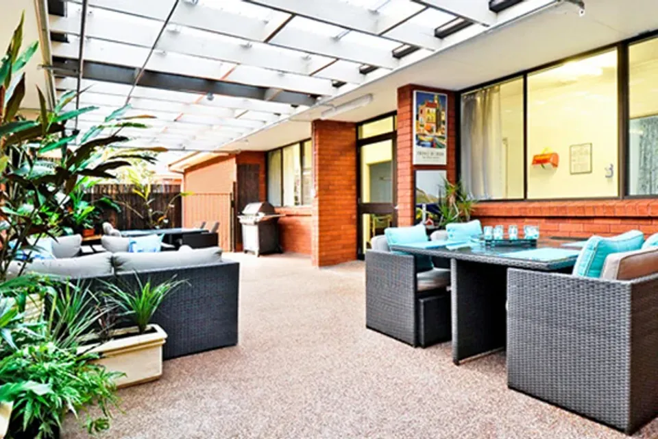 Covered patio with wicker sofas