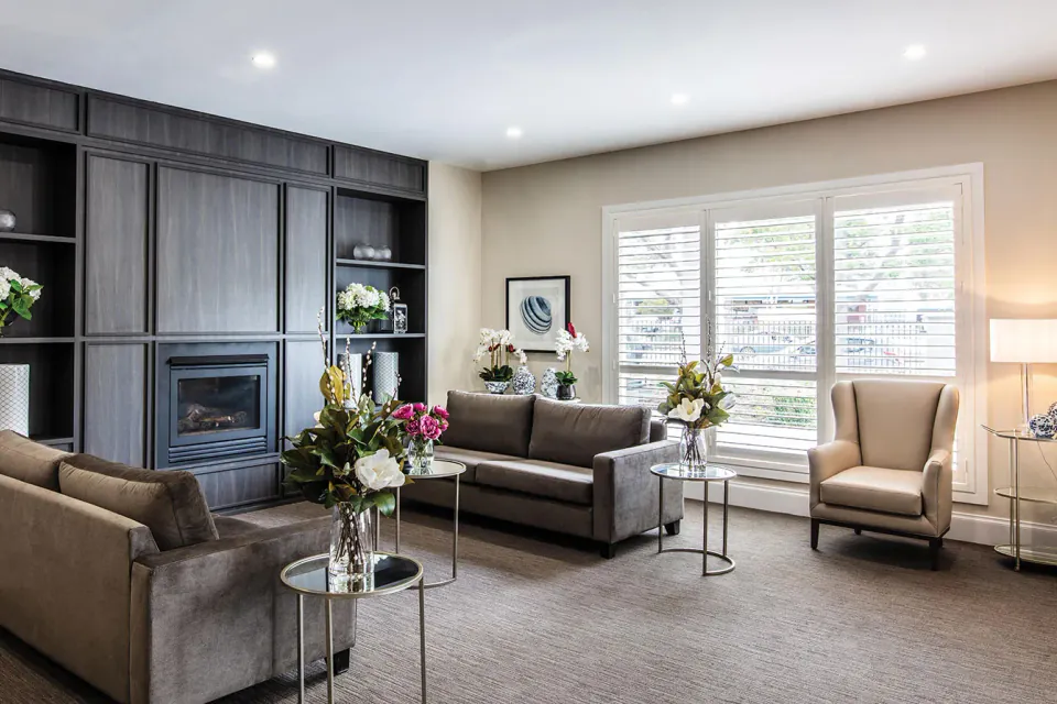 Living room with sofas around a fireplace