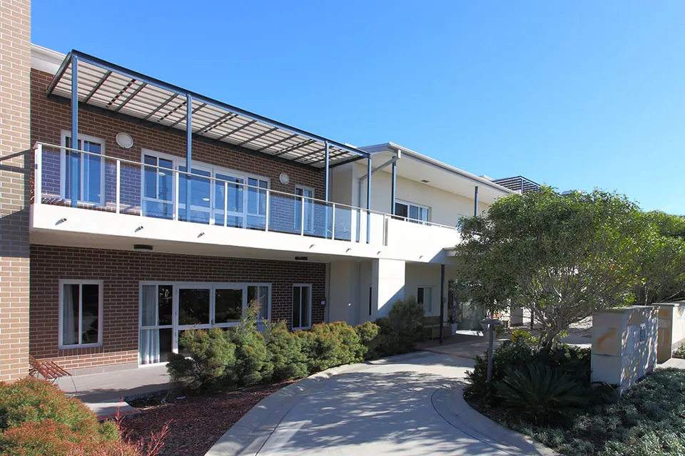 Two-storey residence with garden path and balconies
