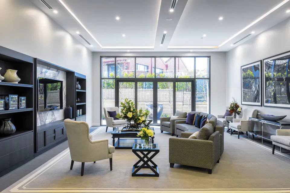 Lounge with sofas facing garden windows