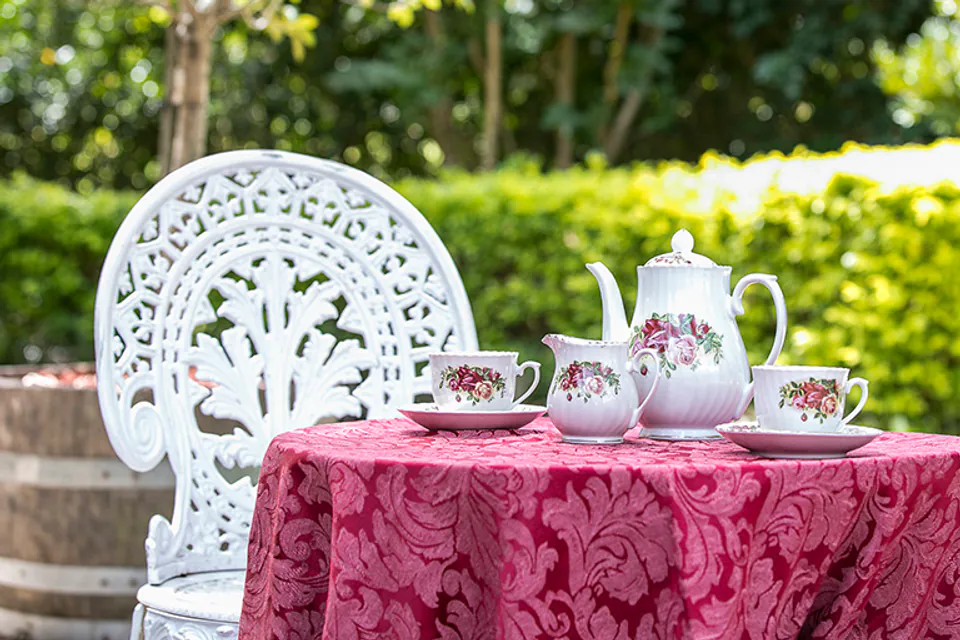 Outdoor tea setting on a garden patio