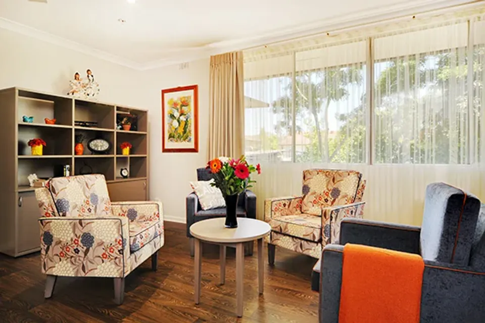 Lounge corner with floral armchairs