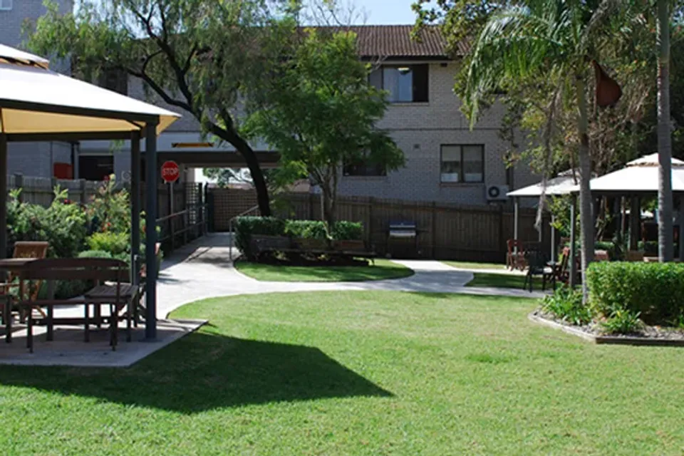 Garden lawn and gazebo beside the residence